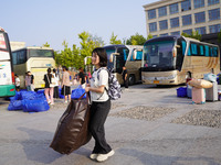 DEZHOU, CHINA - SEPTEMBER 7, 2023 - Students of Dezhou University in Shandong province carry their luggage and prepare to go to the grassroo...