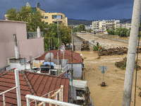 The aftermath of the fierce rainstorms hit central Greece showing the damage from the floods while roads are still covered by floodwater and...