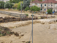 The aftermath of the fierce rainstorms hit central Greece showing the damage from the floods while roads are still covered by floodwater and...