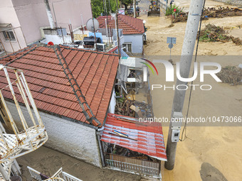 The aftermath of the fierce rainstorms hit central Greece showing the damage from the floods while roads are still covered by floodwater and...