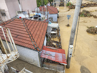 The aftermath of the fierce rainstorms hit central Greece showing the damage from the floods while roads are still covered by floodwater and...