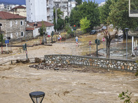 The aftermath of the fierce rainstorms hit central Greece showing the damage from the floods while roads are still covered by floodwater and...