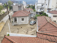 The aftermath of the fierce rainstorms hit central Greece showing the damage from the floods while roads are still covered by floodwater and...