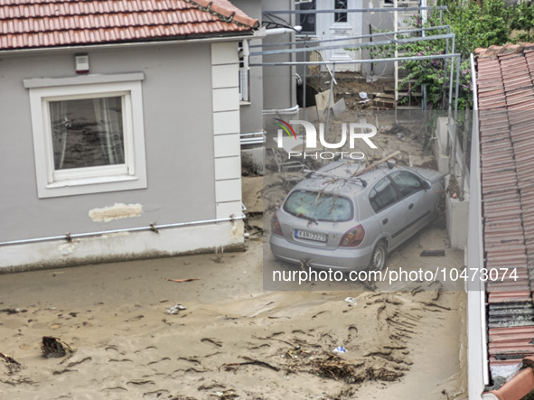 The aftermath of the fierce rainstorms hit central Greece showing the damage from the floods while roads are still covered by floodwater and...