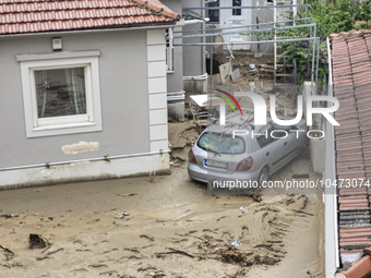 The aftermath of the fierce rainstorms hit central Greece showing the damage from the floods while roads are still covered by floodwater and...