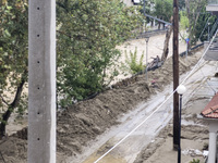 The aftermath of the fierce rainstorms hit central Greece showing the damage from the floods while roads are still covered by floodwater and...