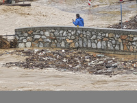 The aftermath of the fierce rainstorms hit central Greece showing the damage from the floods while roads are still covered by floodwater and...