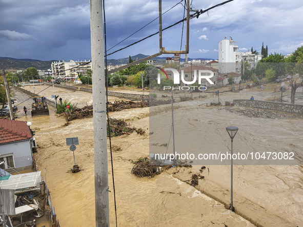 The aftermath of the fierce rainstorms hit central Greece showing the damage from the floods while roads are still covered by floodwater and...