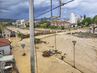 The aftermath of the fierce rainstorms hit central Greece showing the damage from the floods while roads are still covered by floodwater and...