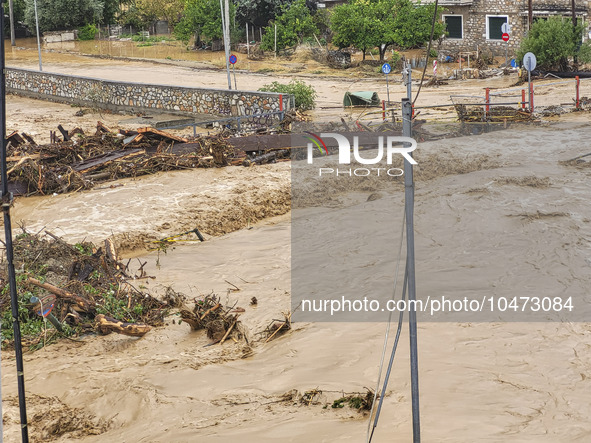 The aftermath of the fierce rainstorms hit central Greece showing the damage from the floods while roads are still covered by floodwater and...