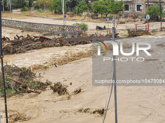 The aftermath of the fierce rainstorms hit central Greece showing the damage from the floods while roads are still covered by floodwater and...