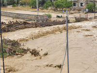 The aftermath of the fierce rainstorms hit central Greece showing the damage from the floods while roads are still covered by floodwater and...