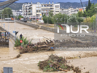 The aftermath of the fierce rainstorms hit central Greece showing the damage from the floods while roads are still covered by floodwater and...