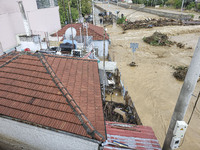 The aftermath of the fierce rainstorms hit central Greece showing the damage from the floods while roads are still covered by floodwater and...