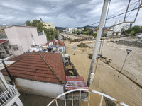 The aftermath of the fierce rainstorms hit central Greece showing the damage from the floods while roads are still covered by floodwater and...