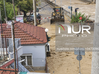 The aftermath of the fierce rainstorms hit central Greece showing the damage from the floods while roads are still covered by floodwater and...