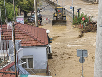 The aftermath of the fierce rainstorms hit central Greece showing the damage from the floods while roads are still covered by floodwater and...