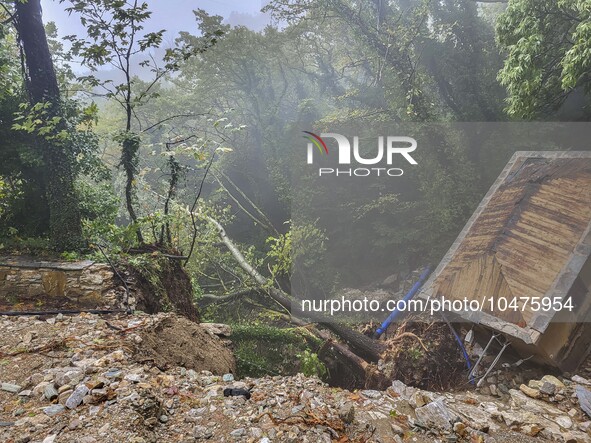 Pelion Mountain hit by the fierce rainstorm causing damage or vanishing the road network and houses collapsing in landslides while trapped p...