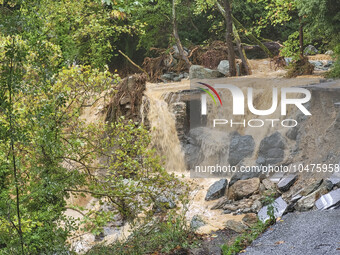 Pelion Mountain hit by the fierce rainstorm causing damage or vanishing the road network and houses collapsing in landslides while trapped p...