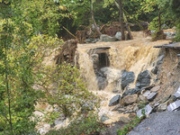 Pelion Mountain hit by the fierce rainstorm causing damage or vanishing the road network and houses collapsing in landslides while trapped p...