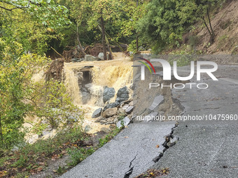 Pelion Mountain hit by the fierce rainstorm causing damage or vanishing the road network and houses collapsing in landslides while trapped p...