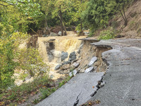 Pelion Mountain hit by the fierce rainstorm causing damage or vanishing the road network and houses collapsing in landslides while trapped p...