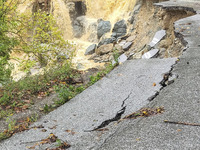 Pelion Mountain hit by the fierce rainstorm causing damage or vanishing the road network and houses collapsing in landslides while trapped p...