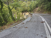 Pelion Mountain hit by the fierce rainstorm causing damage or vanishing the road network and houses collapsing in landslides while trapped p...