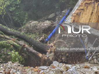 Pelion Mountain hit by the fierce rainstorm causing damage or vanishing the road network and houses collapsing in landslides while trapped p...