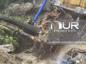 Pelion Mountain hit by the fierce rainstorm causing damage or vanishing the road network and houses collapsing in landslides while trapped p...