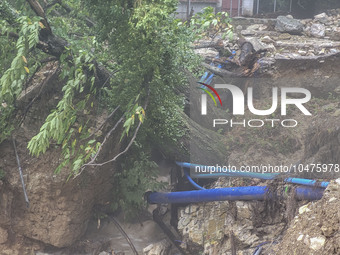 Pelion Mountain hit by the fierce rainstorm causing damage or vanishing the road network and houses collapsing in landslides while trapped p...