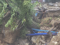 Pelion Mountain hit by the fierce rainstorm causing damage or vanishing the road network and houses collapsing in landslides while trapped p...