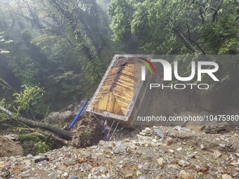 Pelion Mountain hit by the fierce rainstorm causing damage or vanishing the road network and houses collapsing in landslides while trapped p...