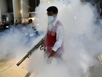 A City Corporation Worker Sprays Dengue Repellent at a hospital area in Dhaka, Bangladesh, on September 9, 2023. The death toll from dengue...