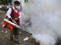 A City Corporation Worker Sprays Dengue Repellent at a hospital area in Dhaka, Bangladesh, on September 9, 2023. The death toll from dengue...