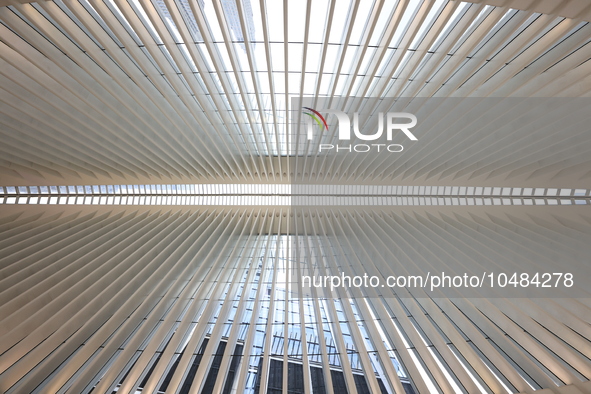 The Oculus at the World Trade Center is fill with crowds as U.S. flags from ceiling to commemorate the 9/11 Anniversary in New York, New Yor...