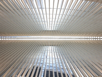 The Oculus at the World Trade Center is fill with crowds as U.S. flags from ceiling to commemorate the 9/11 Anniversary in New York, New Yor...