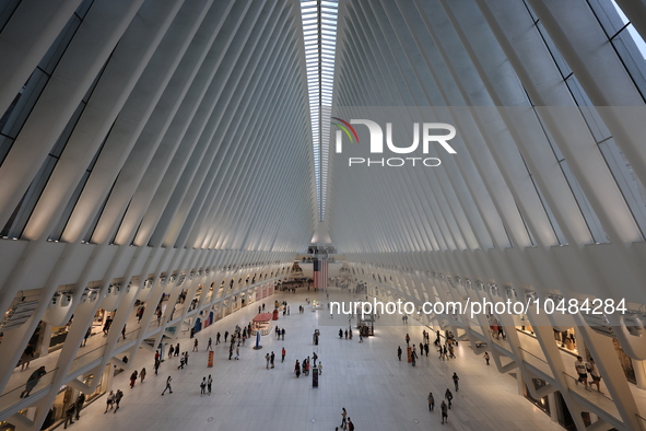 The Oculus at the World Trade Center is fill with crowds as U.S. flags from ceiling to commemorate the 9/11 Anniversary in New York, New Yor...