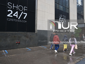 Pedestrians walk along Church Street outside of Century 21 in New York, New York, Saturday, Sept. 9, 2023. (