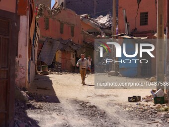 A man strolls through the heart of Amizmiz, just a few dozen kilometers away from the epicenter of the earthquake that rattled Morocco. (