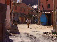 A man strolls through the heart of Amizmiz, just a few dozen kilometers away from the epicenter of the earthquake that rattled Morocco. (