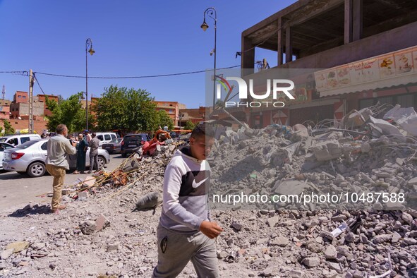 A young man strolls through the heart of Amizmiz, just a few dozen kilometers away from the epicenter of the earthquake that rattled Morocco...