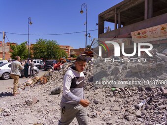 A young man strolls through the heart of Amizmiz, just a few dozen kilometers away from the epicenter of the earthquake that rattled Morocco...