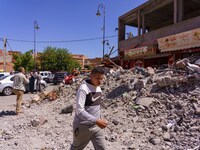 A young man strolls through the heart of Amizmiz, just a few dozen kilometers away from the epicenter of the earthquake that rattled Morocco...