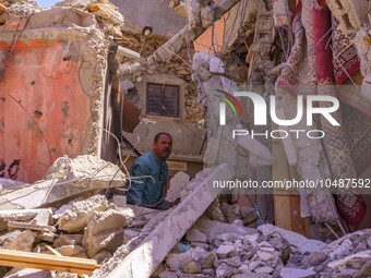 A man is searching for his belongings in what remains of his house in the city of Amizmiz, located just a few dozen kilometers from the epic...