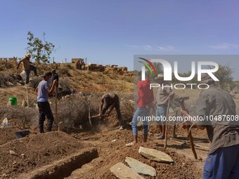 Men are digging graves to accommodate the earthquake victims in the village of Tafeghaghte, located just a few kilometers from the epicenter...