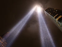 The Tribute in Light rises above the New York City skyline from the rooftop of where the installation was projected to commemorate the 9/11...