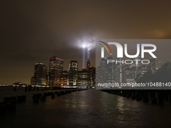 The Tribute in Light rises above the New York City skyline from Brooklyn to commemorate the 9/11 Anniversary in New York, New York, Sunday,...