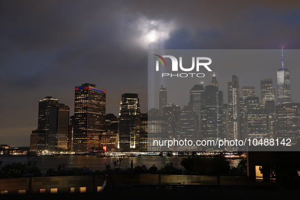 The Tribute in Light rises above the New York City skyline from Brooklyn to commemorate the 9/11 Anniversary in New York, New York, Sunday,...