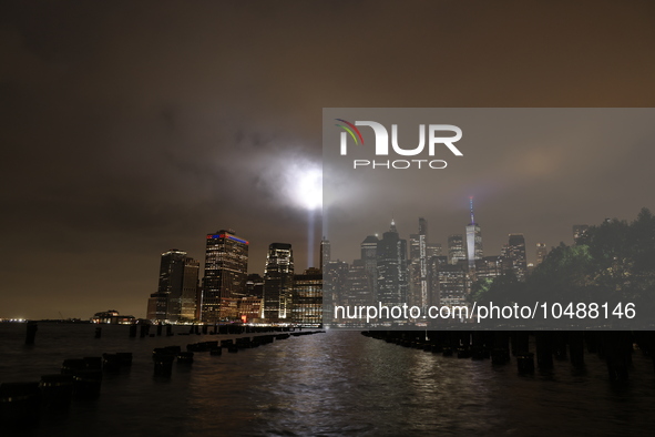 The Tribute in Light rises above the New York City skyline from Brooklyn to commemorate the 9/11 Anniversary in New York, New York, Sunday,...